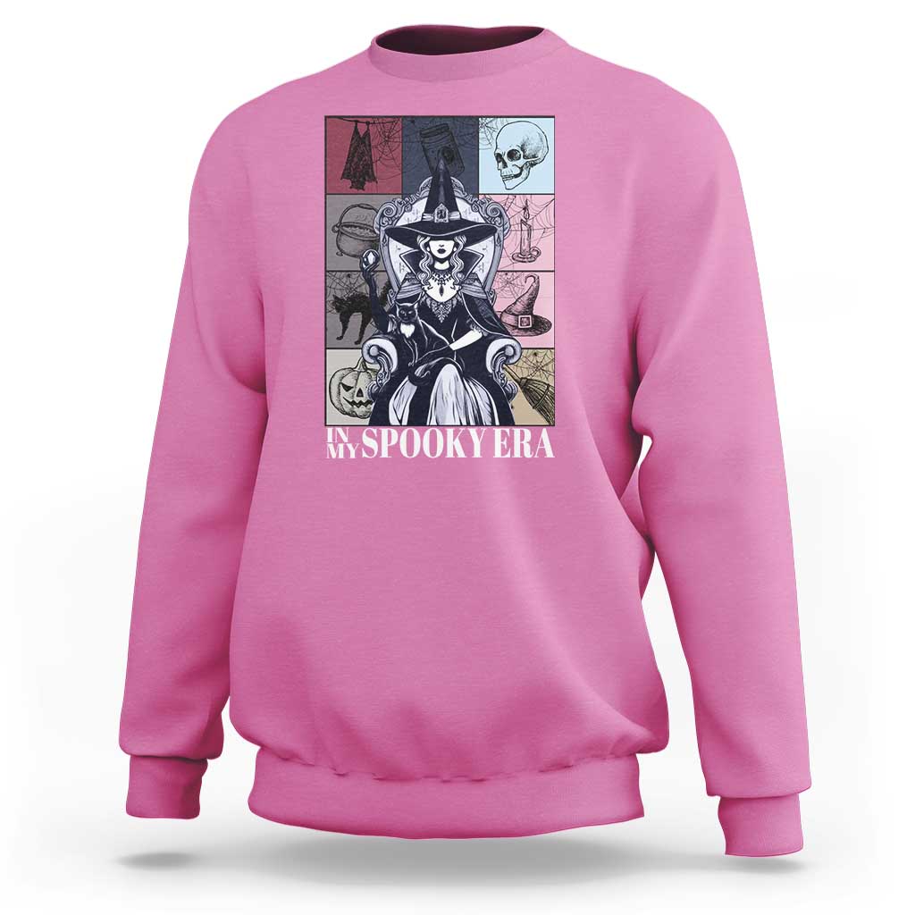 Halloween witch sweatshirt in light pink with front witch graphic and text