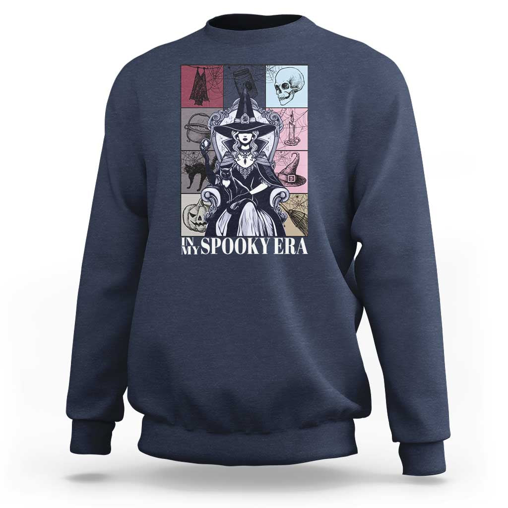 Halloween witch sweatshirt in blue with front witch graphic and text