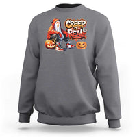 Charcoal gray crewneck sweatshirt with colorful ghost and jack-o'-lantern graphic on chest