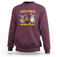 Maroon crewneck sweatshirt with 'Chick or Treat' chicken witch graphic