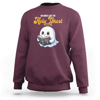 Maroon Christian Halloween sweatshirt with cartoon holy ghost holding book graphic