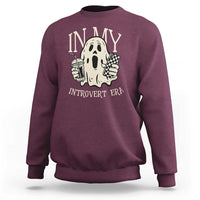Maroon crewneck sweatshirt, back ghost graphic with 'IN MY INTROVERT ERA' text.