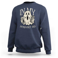 Navy crewneck sweatshirt, back graphic of ghost and text 'IN MY INTROVERT ERA'.