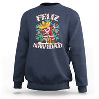 Navy Christmas sweatshirt with dabbing snowman graphic reading “FELIZ NAVIDAD”.