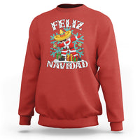 Red Christmas sweatshirt with dabbing snowman graphic reading “FELIZ NAVIDAD”.