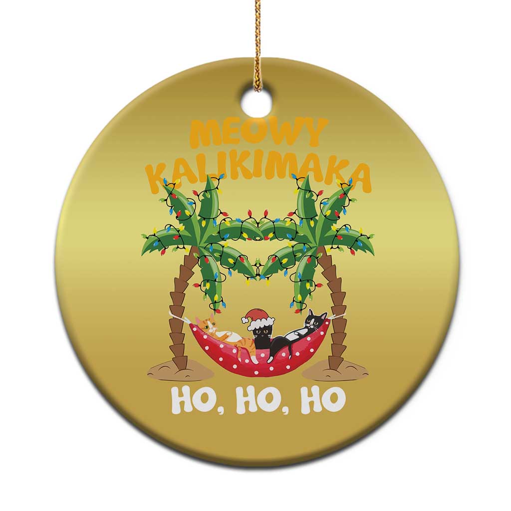 Gold round cat-in-hammock Christmas ornament with palm trees and 'Meowy Kalikimaka'
