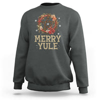 Dark heather gray sweatshirt with floral wreath pentagram and 'Merry Yule' front graphic