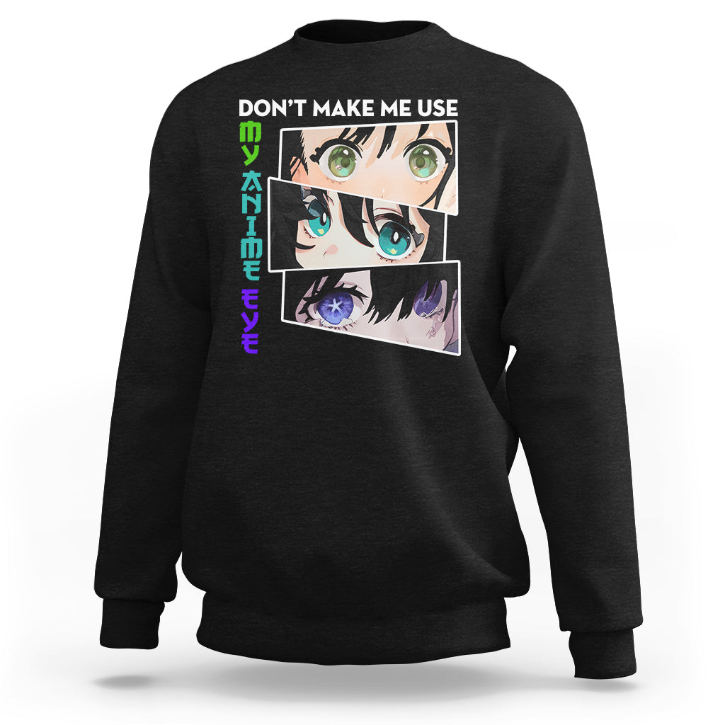 Black sweatshirt with 'DON'T MAKE ME USE' anime eyes graphic