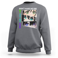 Charcoal sweatshirt with 'DON'T MAKE ME USE' anime eyes graphic