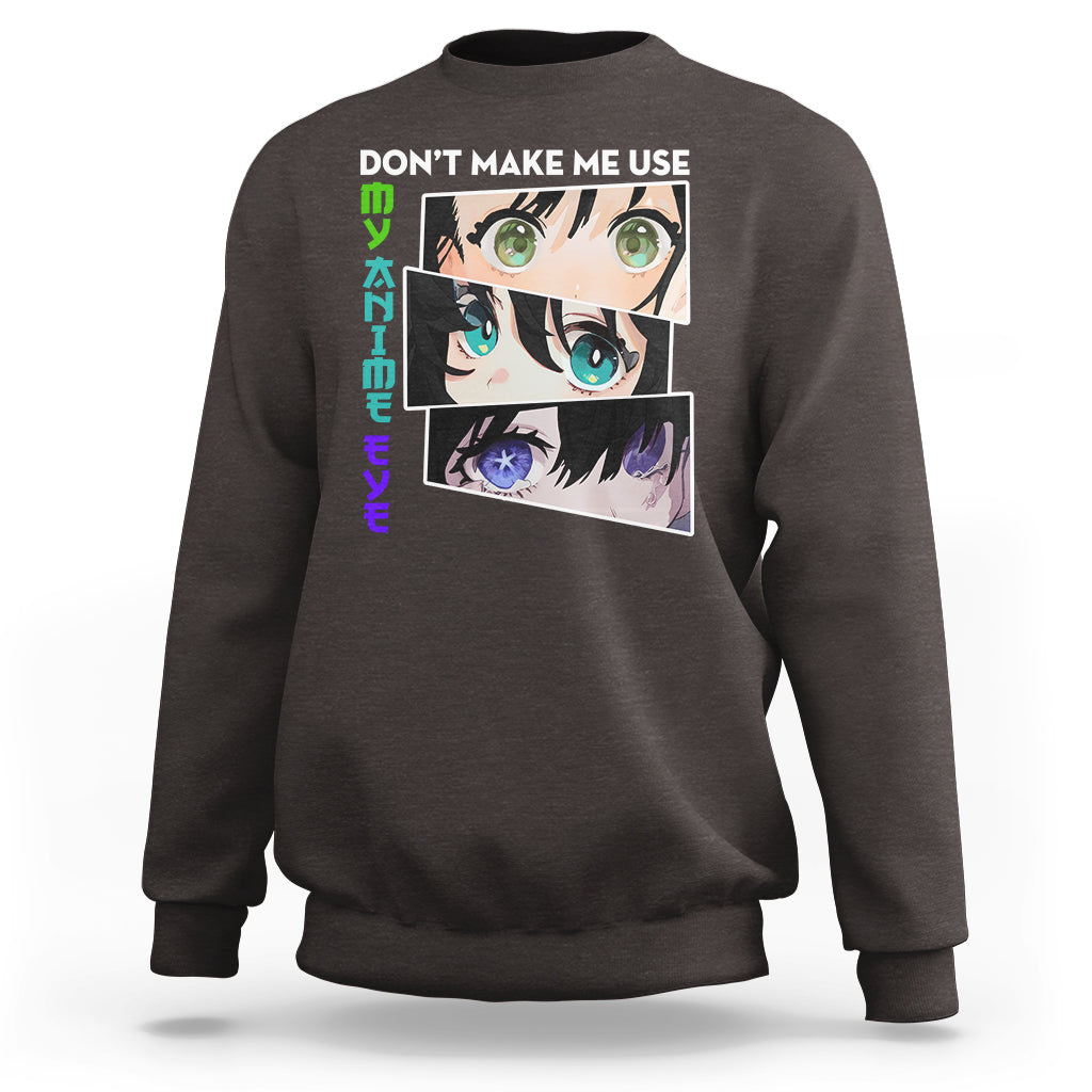 Dark chocolate sweatshirt with 'DON'T MAKE ME USE' anime eyes graphic