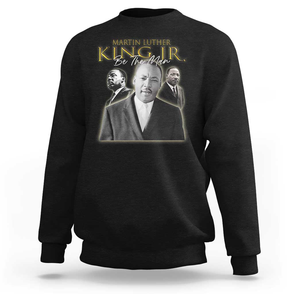 Black sweatshirt with Martin Luther King portrait graphic and "Be the Man" text