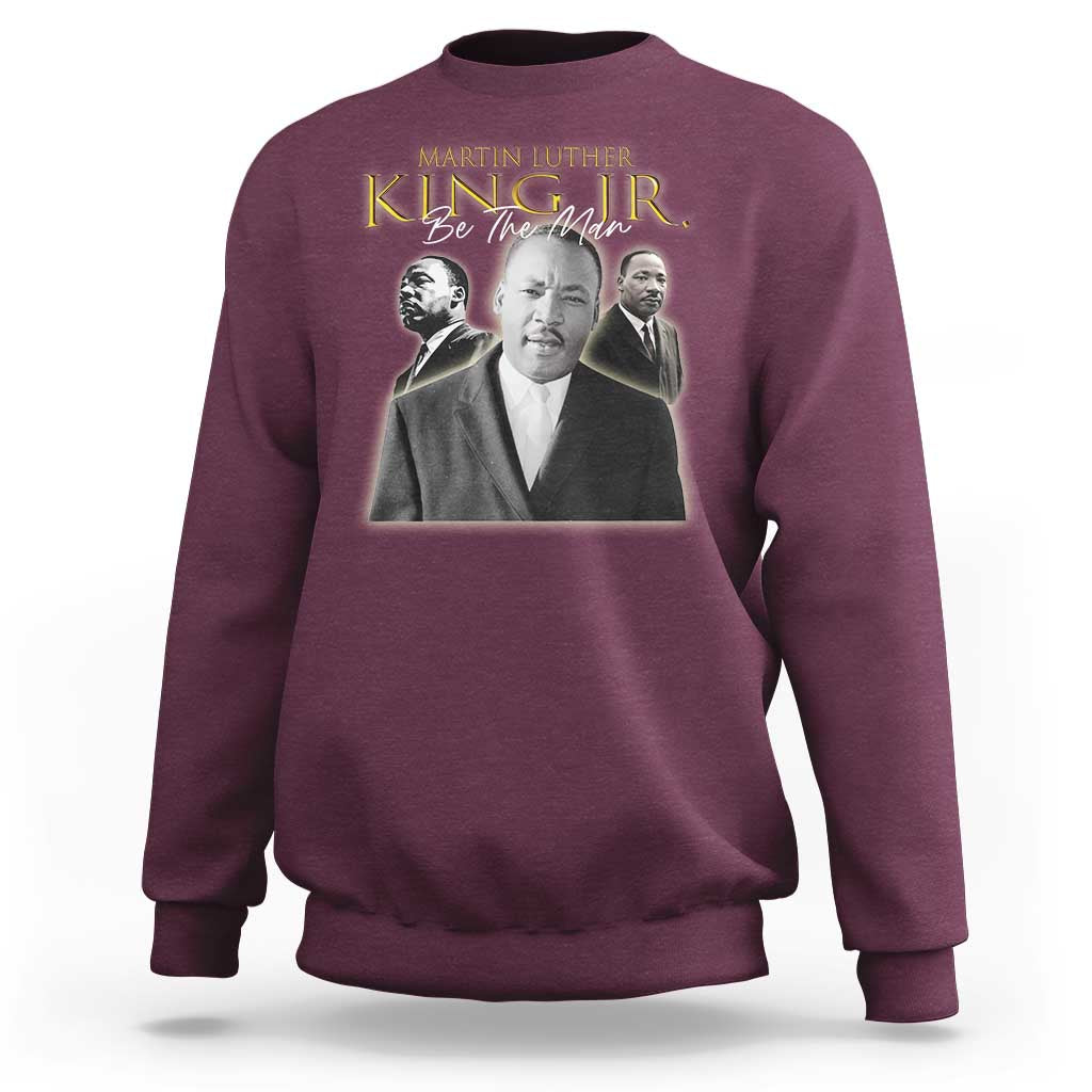 Maroon sweatshirt with Martin Luther King portrait graphic and "Be the Man" text