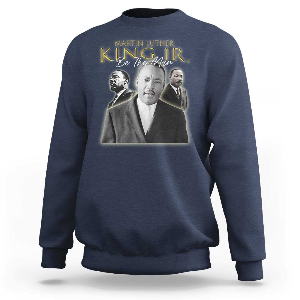 Navy sweatshirt with Martin Luther King portrait graphic and "Be the Man" text
