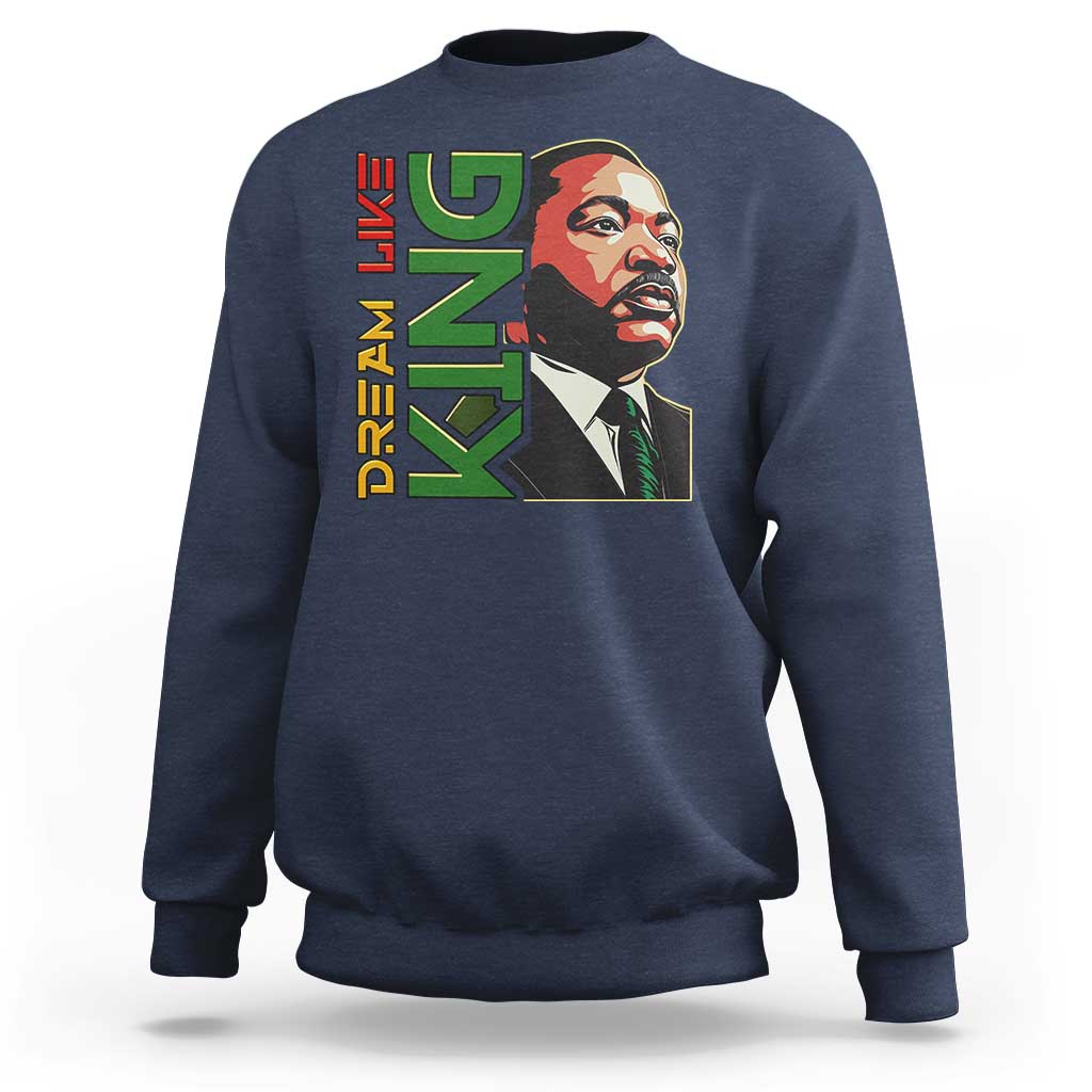 Navy crewneck sweatshirt with MLK portrait and DREAM graphic print.