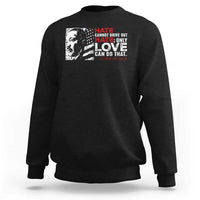 Black crewneck sweatshirt with front graphic print and red/white slogan