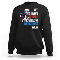 Black crewneck sweatshirt with large front graphic text: “WE HAVE GUIDED MISSILES & MISGUIDED MEN”.