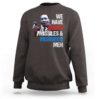Dark chocolate crewneck sweatshirt with large front graphic text: “WE HAVE GUIDED MISSILES & MISGUIDED MEN”.