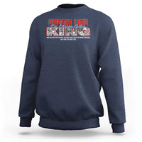 Navy sweatshirt with crew neck and “Dream Like King” front graphic.