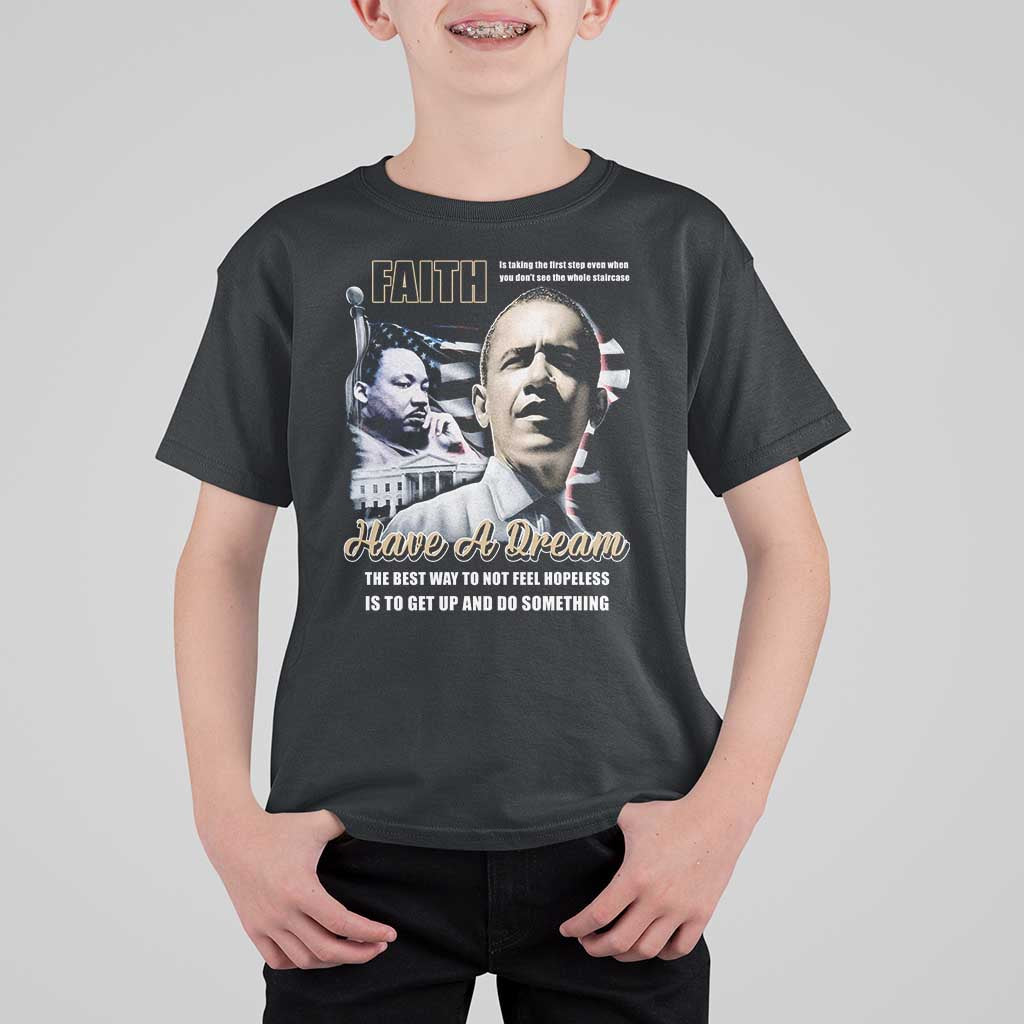 Kids black graphic T-shirt with “Faith” and “Have a Dream” print on front.