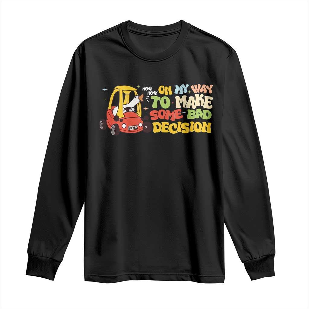 Black long-sleeve T-shirt with cartoon goose and yellow novelty text graphic