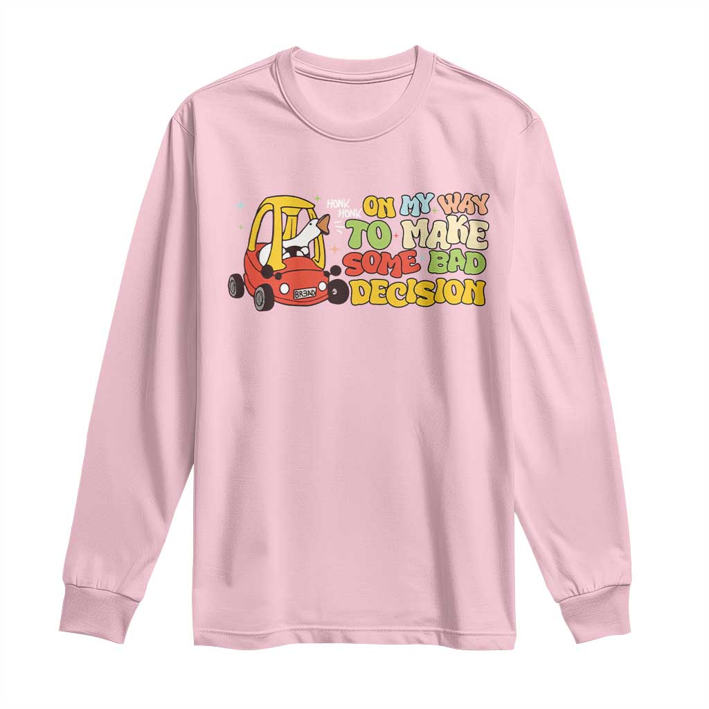 Light pink long-sleeve T-shirt with cartoon goose and yellow novelty text graphic
