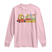 Light pink long-sleeve T-shirt with cartoon goose and yellow novelty text graphic