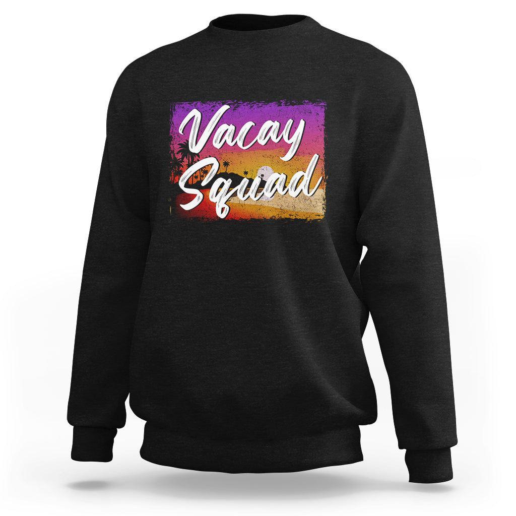 Black crewneck sweatshirt with 'Vacay Squad' colorful beach graphic on chest.