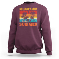 Maroon crewneck sweatshirt with “School’s Out for Summer” beach graphic on front