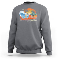 Charcoal gray sweatshirt with front "Sunshine" beach graphic, crew neck, long sleeves.