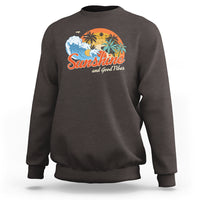 Dark chocolate sweatshirt with front "Sunshine" beach graphic, crew neck, long sleeves.