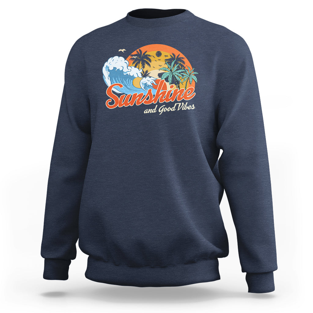 Navy sweatshirt with front "Sunshine" beach graphic, crew neck, long sleeves.