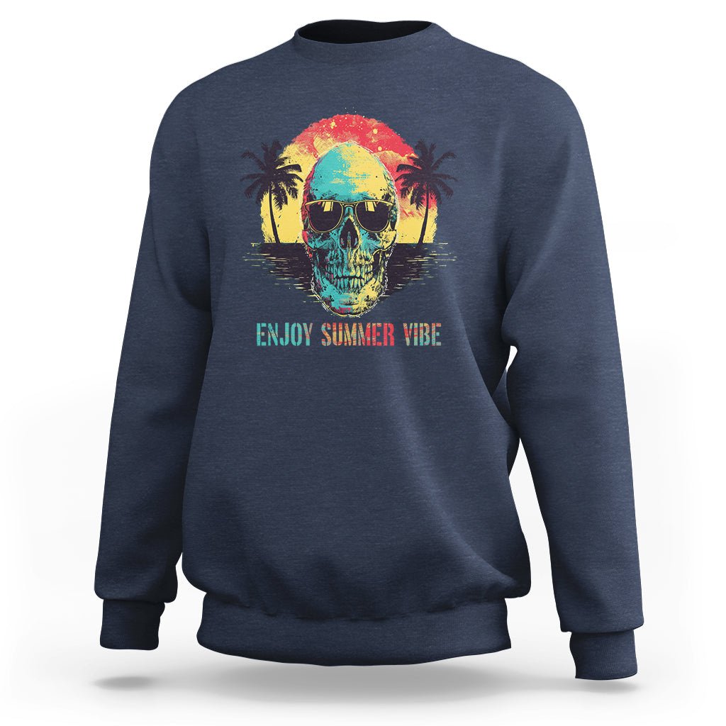 Navy crewneck sweatshirt with colorful skull and sunglasses; tropical “Enjoy Summer Vibe” graphic