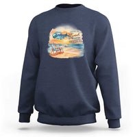 Navy crewneck sweatshirt with beach graphic on chest