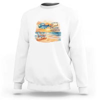 White crewneck sweatshirt with beach graphic on chest