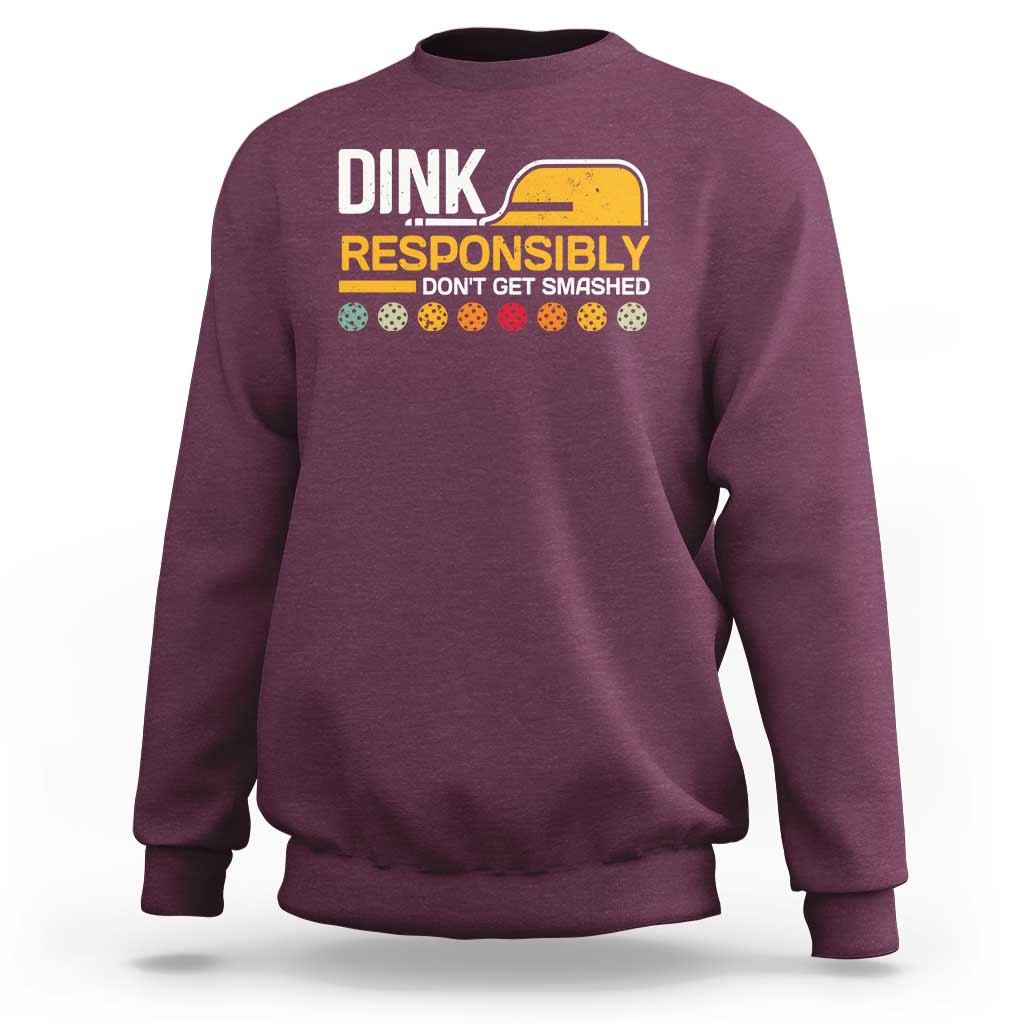Maroon pickleball sweatshirt with “DINK RESPONSIBLY” graphic, long sleeves