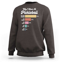 Dark chocolate crewneck sweatshirt with “Why I Lose At Pickleball” graphic on front.