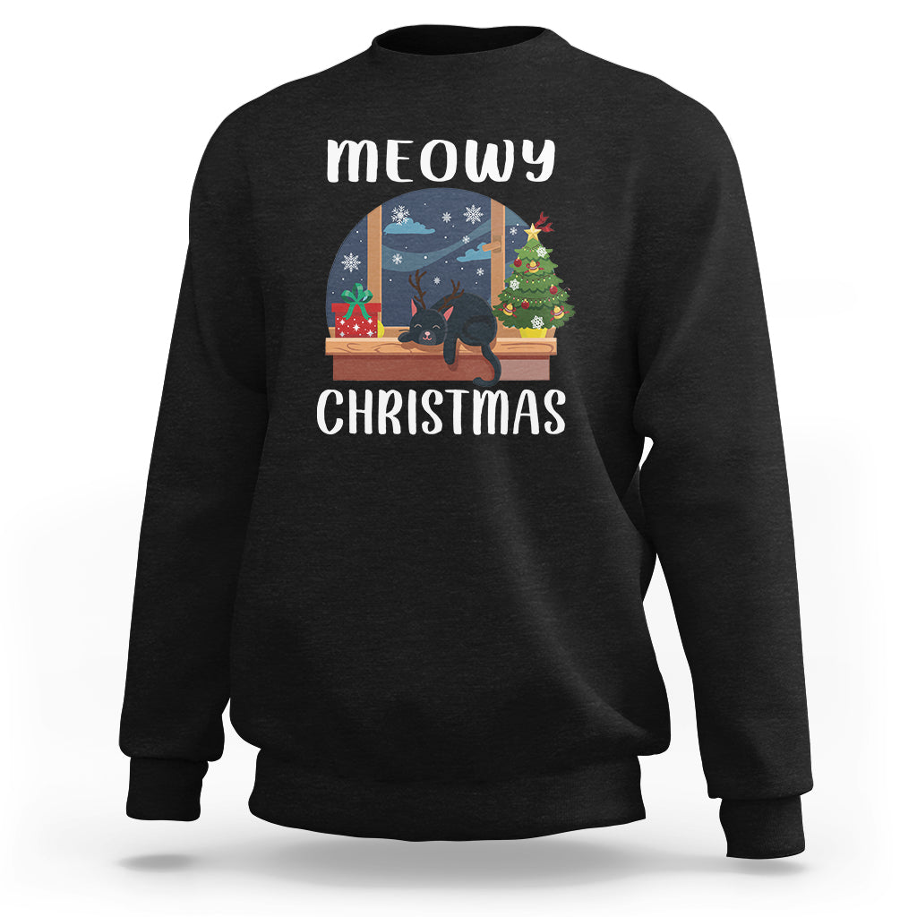 Black crewneck sweatshirt with “meowy CHRISTMAS” cat window graphic on front.