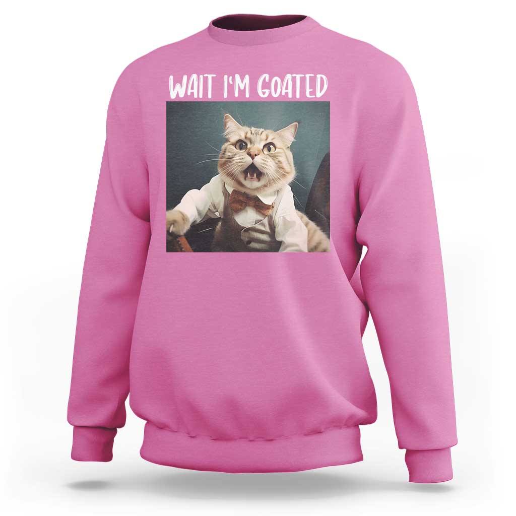 Azalea pink crewneck sweatshirt with cat graphic and "WAIT I'M GOATED" text