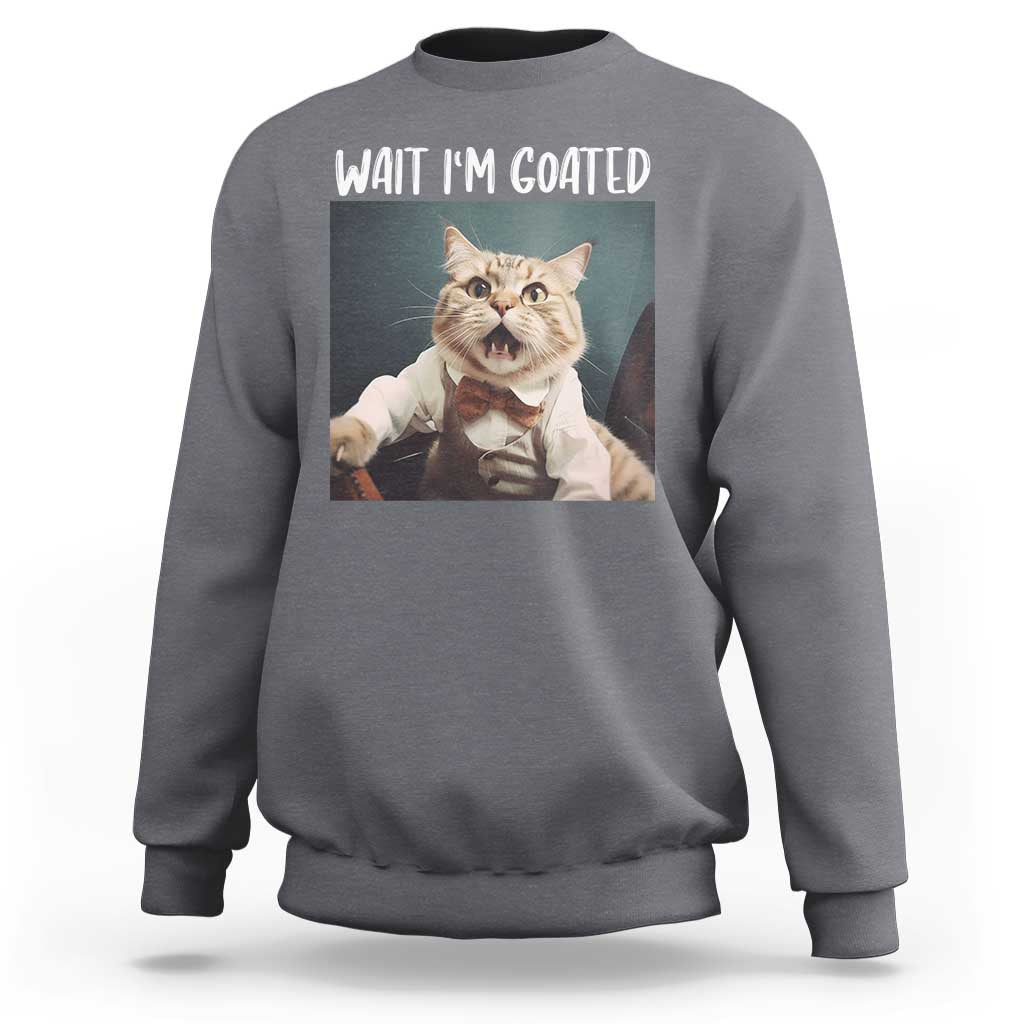 Charcoal gray crewneck sweatshirt with cat graphic and "WAIT I'M GOATED" text