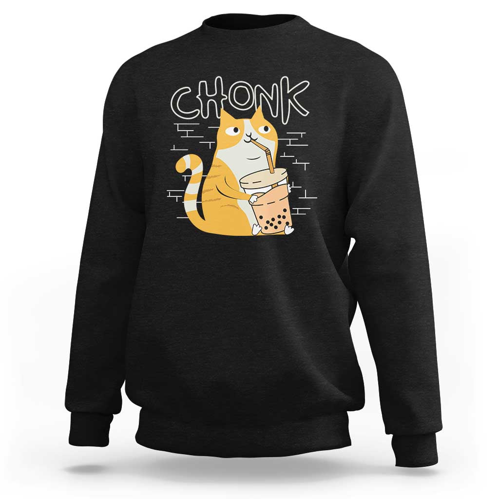 Black sweatshirt with “CHONK” graphic of a cat drinking bubble tea