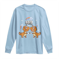 Light blue long-sleeve T-shirt with dinosaur and unicorn graphic on the front