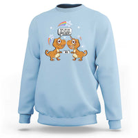 Light blue dinosaur and unicorn graphic sweatshirt, crewneck long sleeves, ribbed cuffs