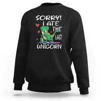 Black sweatshirt with green dinosaur graphic and 'SORRY! EAT THE LAST UNICORN' text
