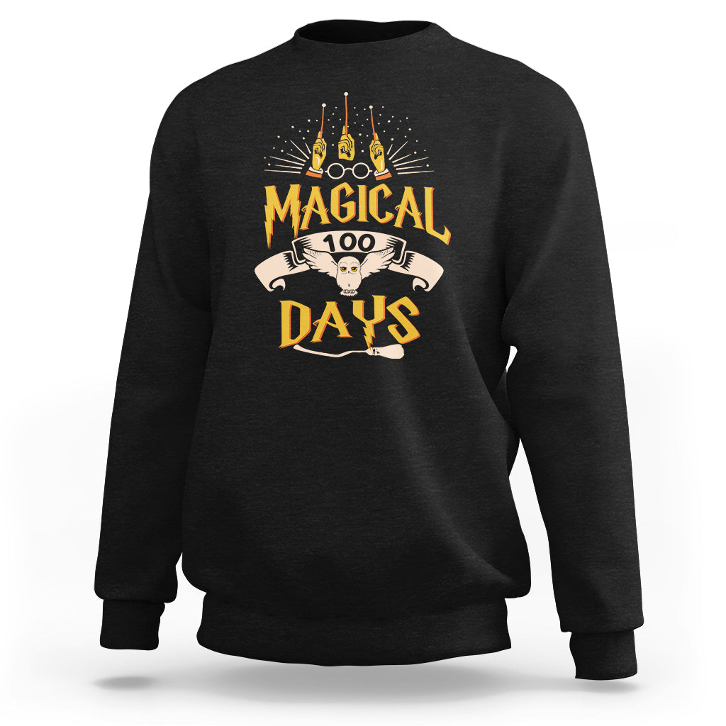 Black crewneck sweatshirt with colorful “Magic Owl” school graphic on the back.