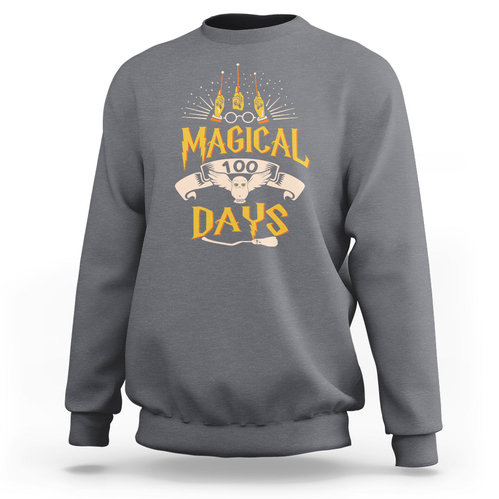 Charcoal gray crewneck sweatshirt with colorful “Magic Owl” school graphic on the back.