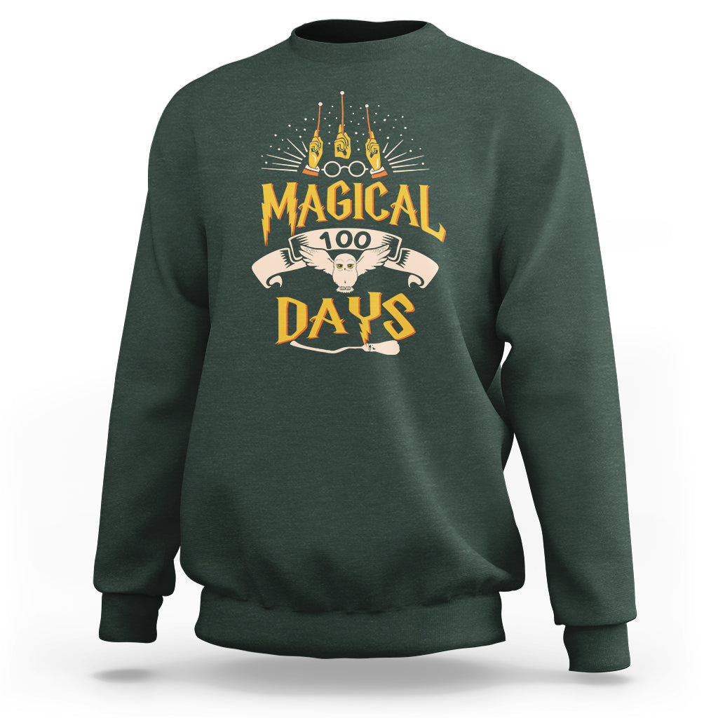 Dark forest green crewneck sweatshirt with colorful “Magic Owl” school graphic on the back.