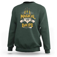 Dark forest green crewneck sweatshirt with colorful “Magic Owl” school graphic on the back.