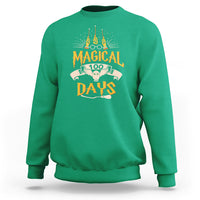 Irish green crewneck sweatshirt with colorful “Magic Owl” school graphic on the back.