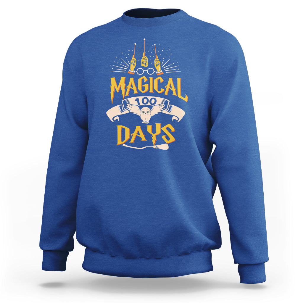 Royal blue crewneck sweatshirt with colorful “Magic Owl” school graphic on the back.