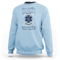 Light blue nurse sweatshirt with superhero graphic and JOB TITLE front print